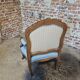 Fauteuil de style Louis XV en bois sculpté – tissu bleu