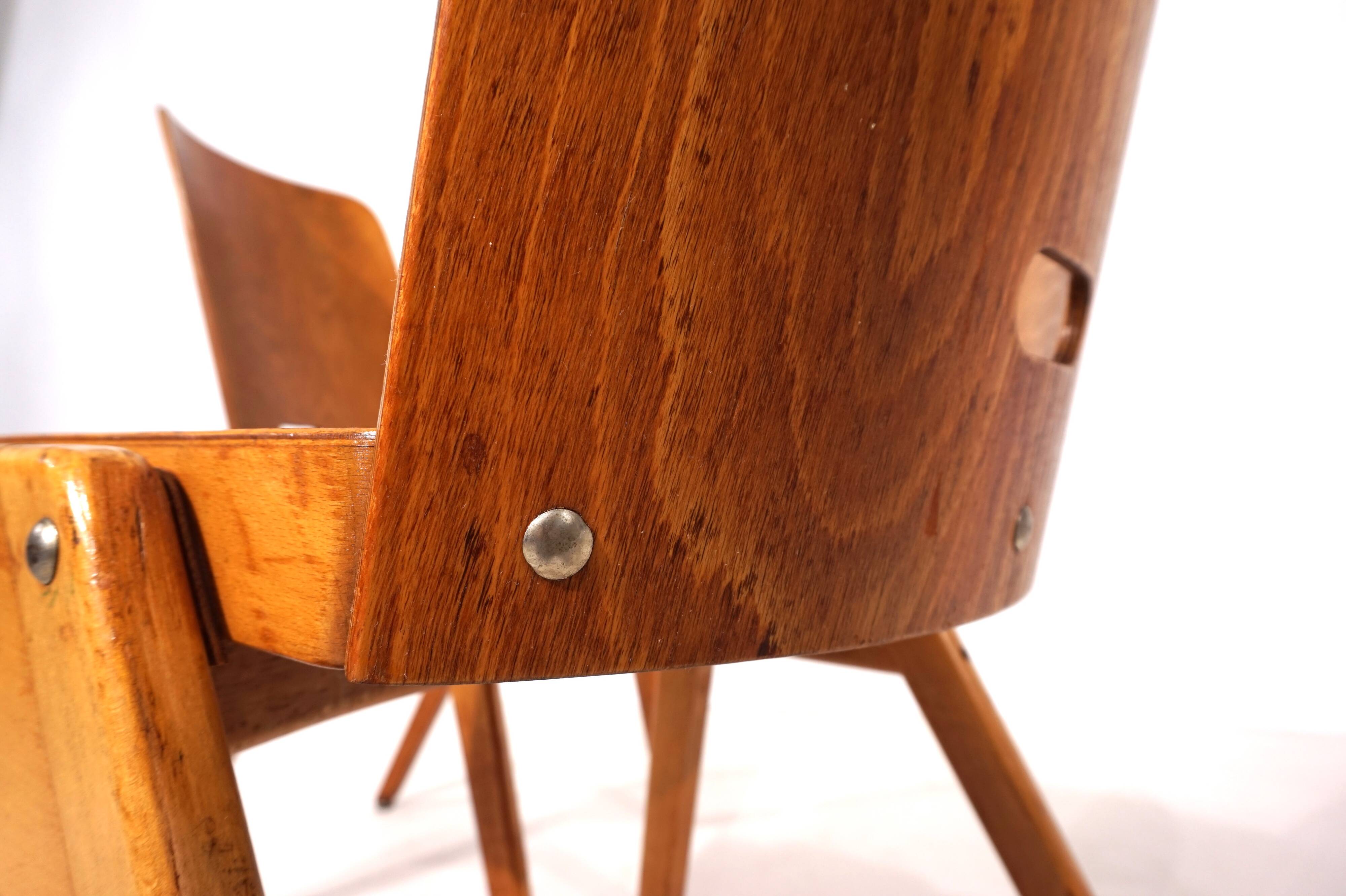 Set of two stackable plywood dining chairs, 1960