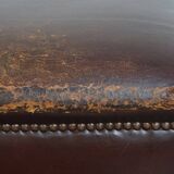 Ottoman vintage en cuir de mouton