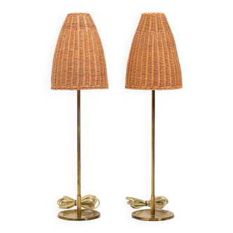 Pair of mid century table lamps with wicker shades by lyfa