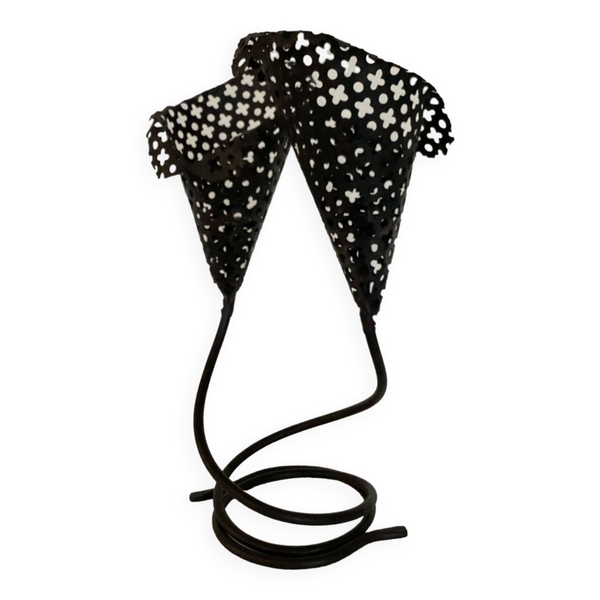 Perforated metal candle holder