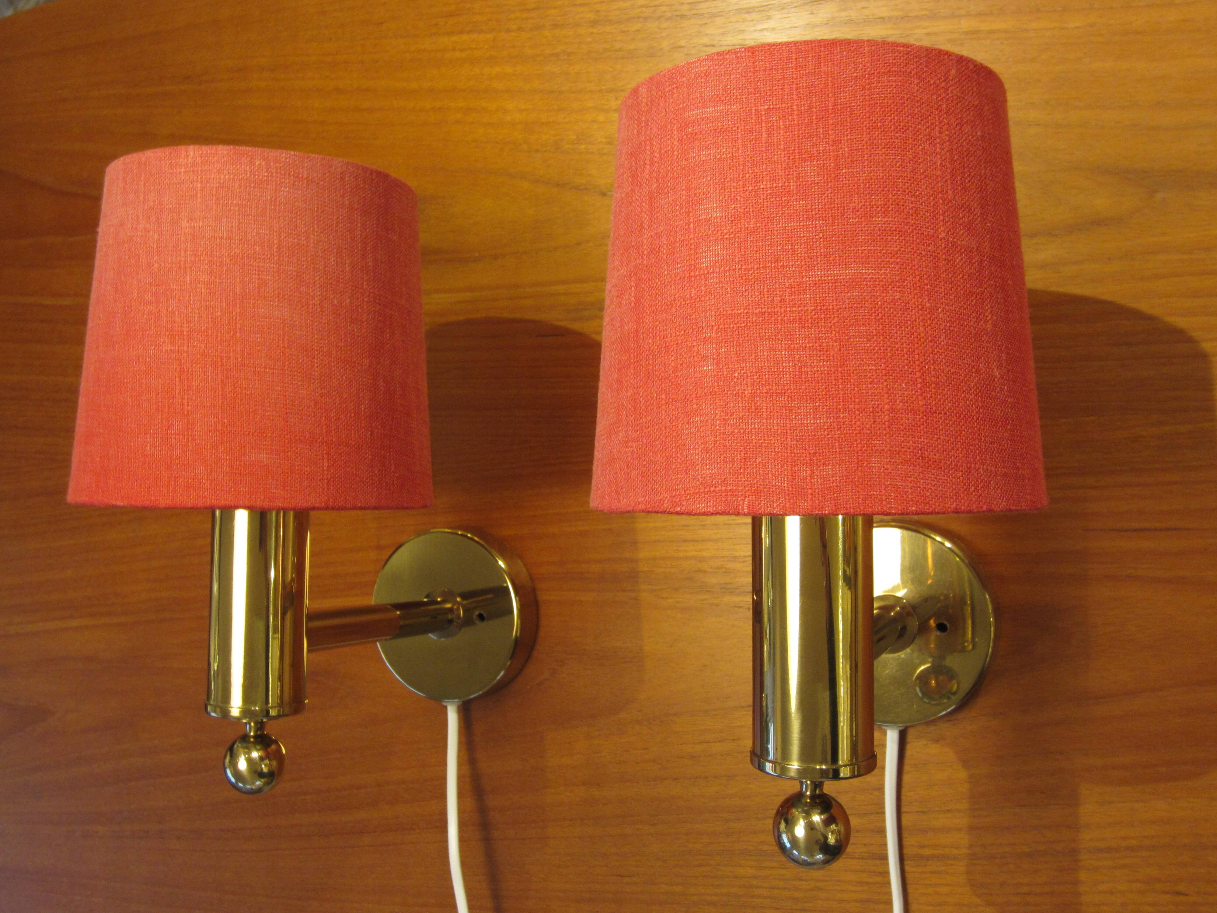 Pair of golden Scandinavian wall lights by Bergboms