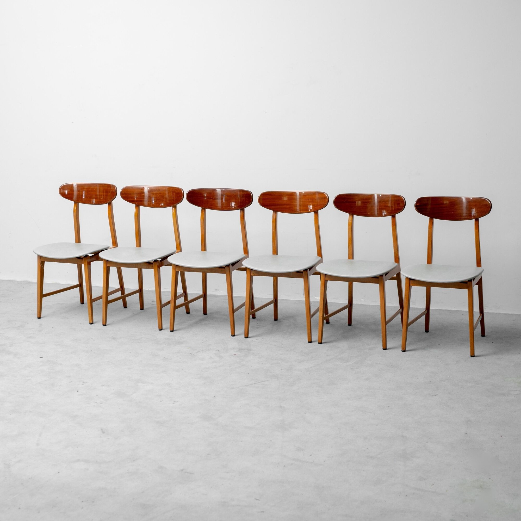 Vintage dining table set with 6 wooden chairs from the 1960s modernism