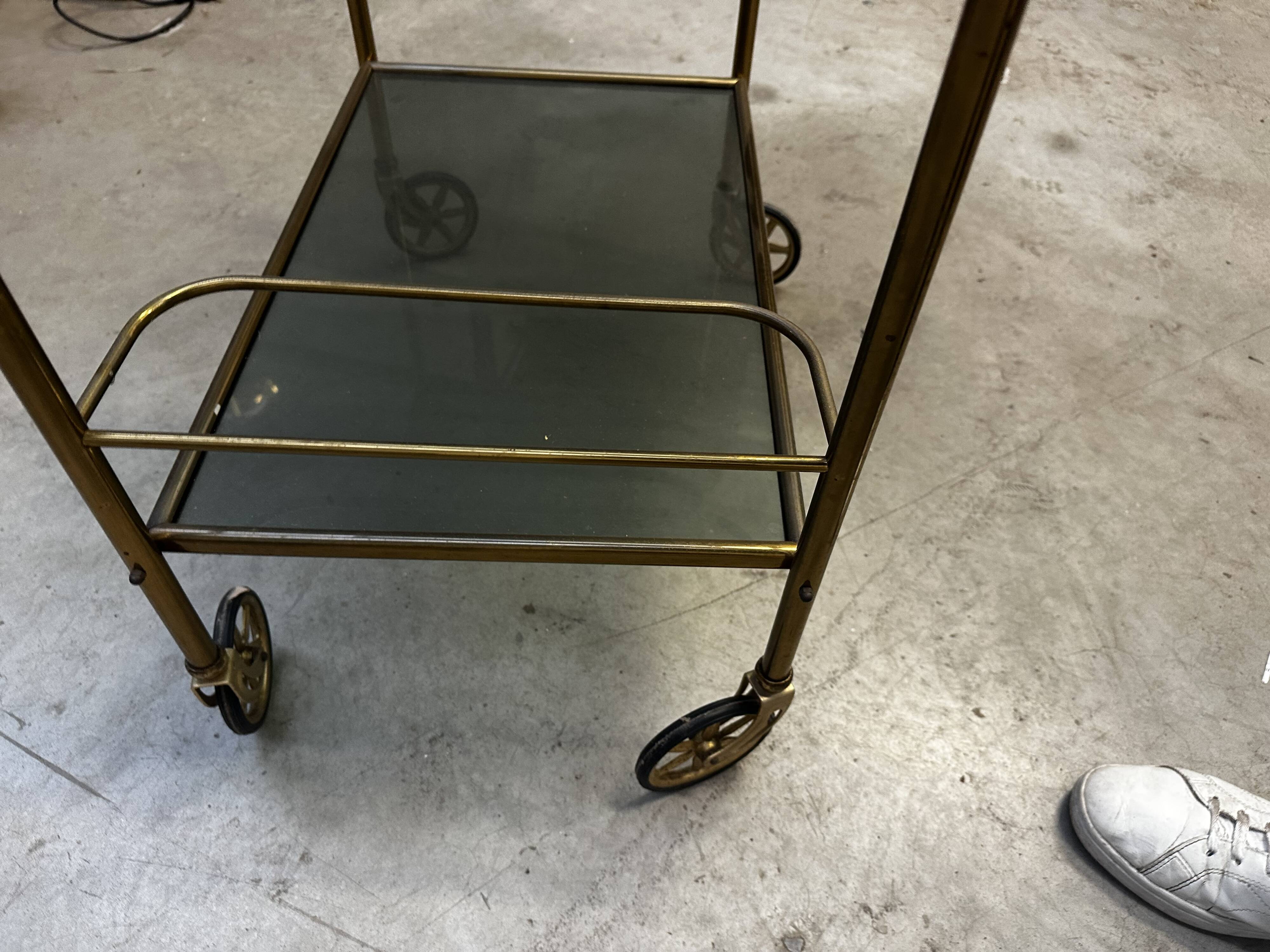 Vintage 70s serving trolley in gold metal and smoked glass