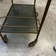 Vintage 70s serving trolley in gold metal and smoked glass