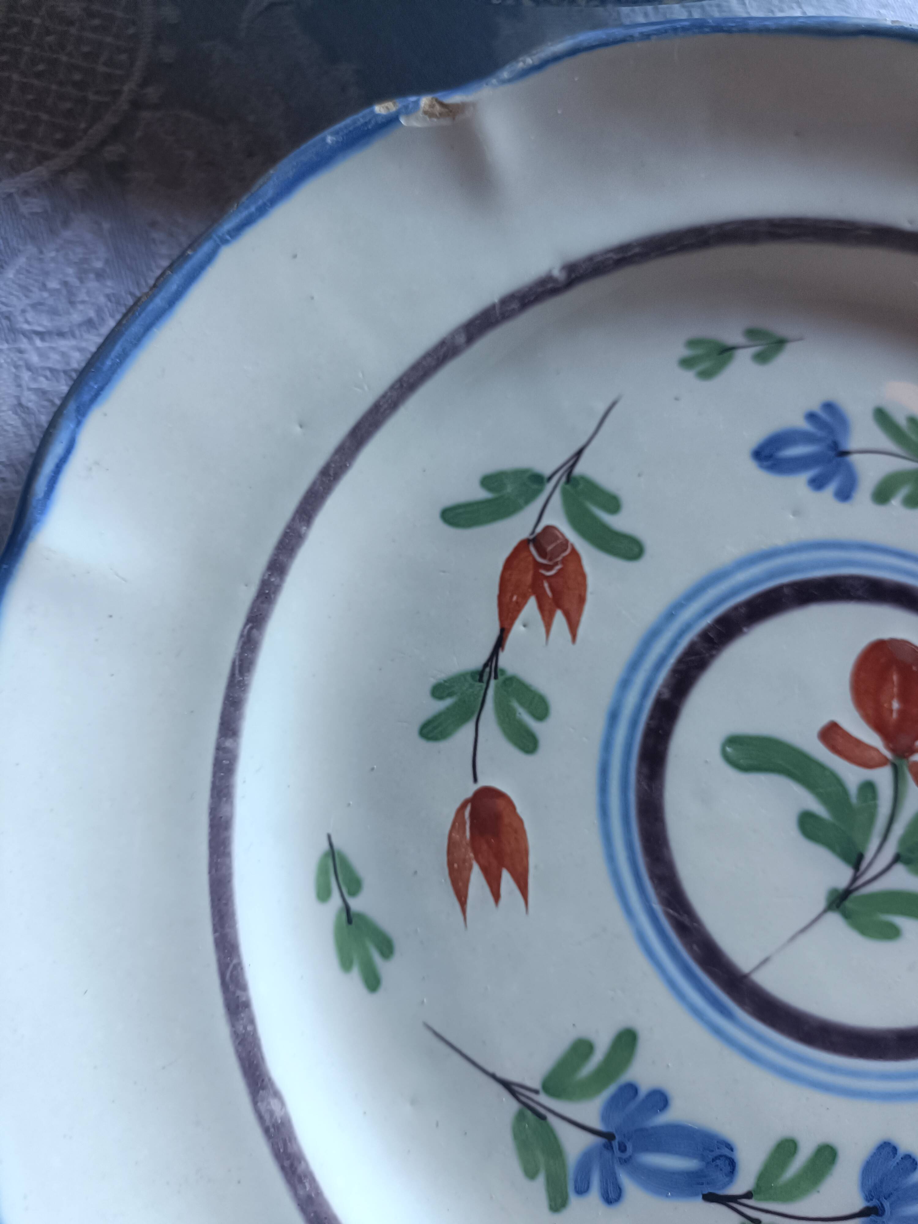 Two 19th-century plates in earthenware.