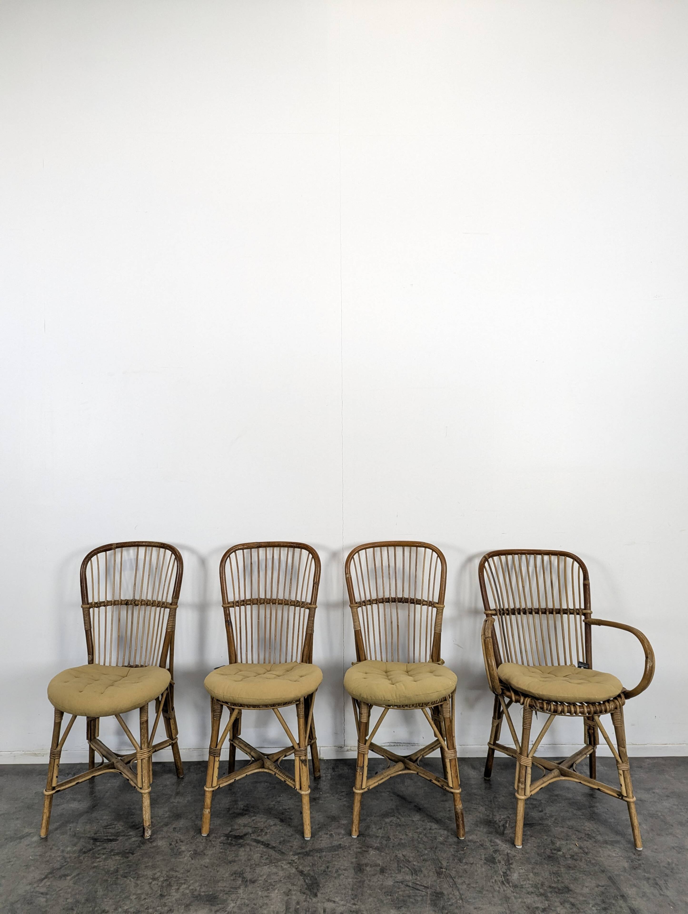 Set of 3 chairs and a rattan armchair.
