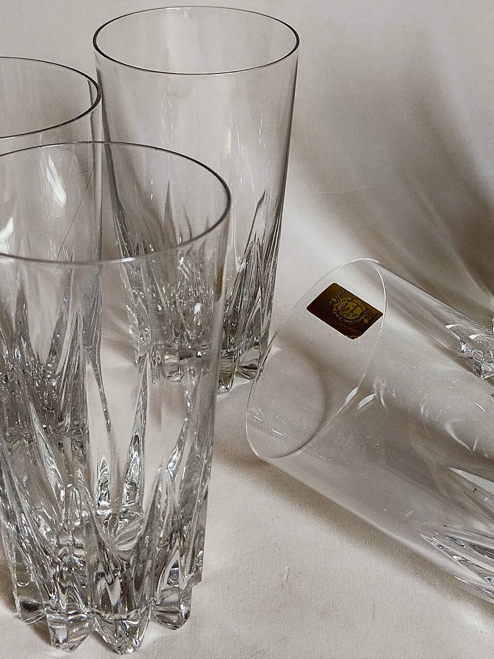 Six vintage crystal juice glasses, three large, three medium