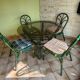Round bamboo rattan table with a glass top.