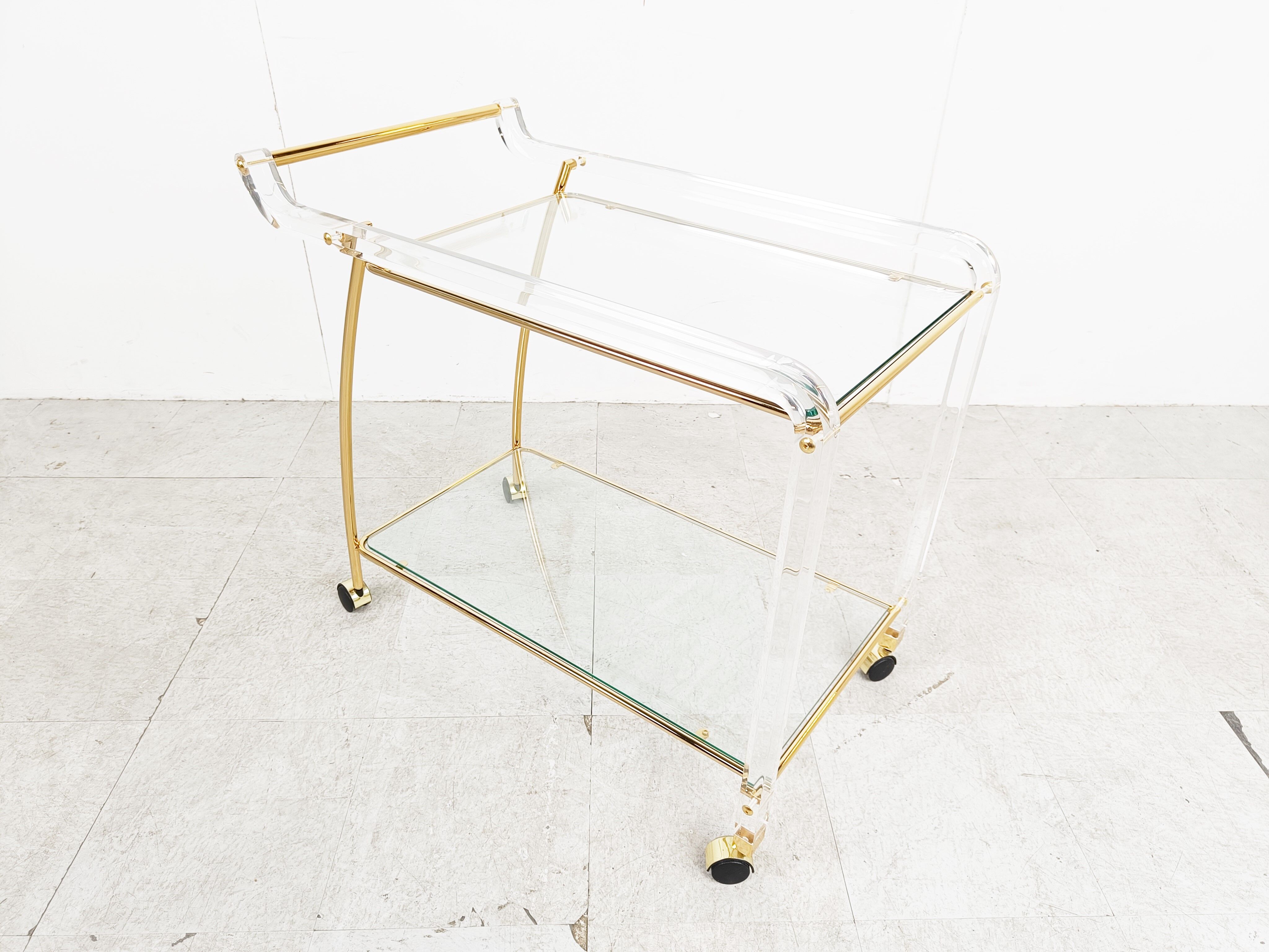 Brass and lucite drinks trolley, 1970s