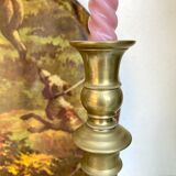 Pair of old candle holders in golden brass