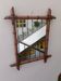 Mirror circa 1950 in bamboo imitation.