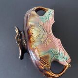 Old earthenware planter. Floral patterns.