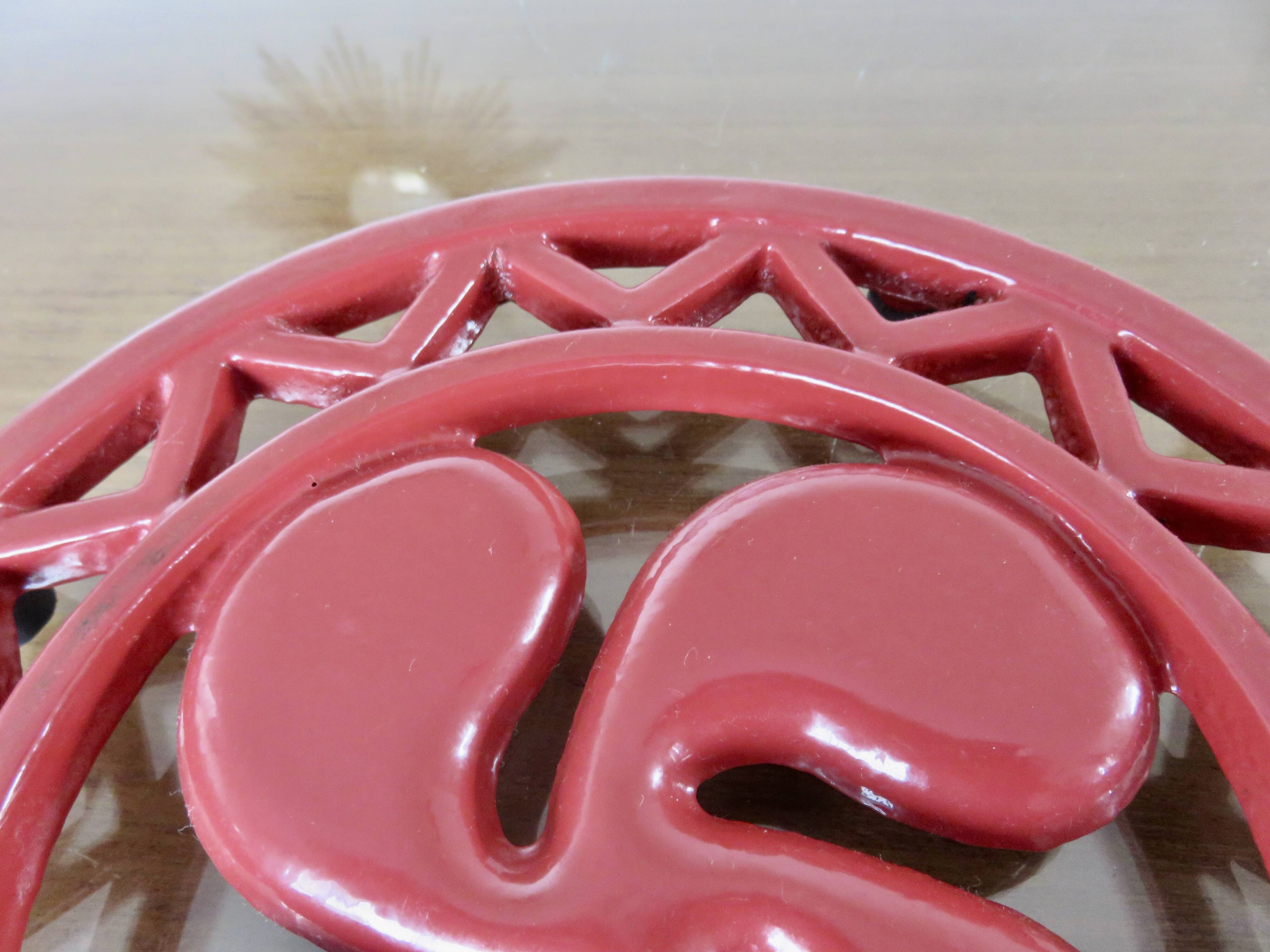 Basque cross trivet in red cast iron 1970