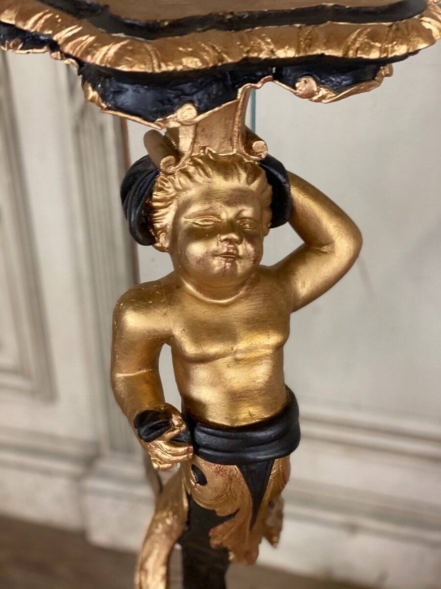 Pair of carved wooden pedestals, black and gold patina circa 1900