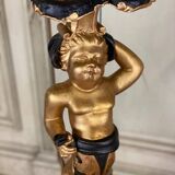 Pair of carved wooden pedestals, black and gold patina circa 1900