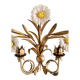 Wall lamp in gilded brass with a daisy design.