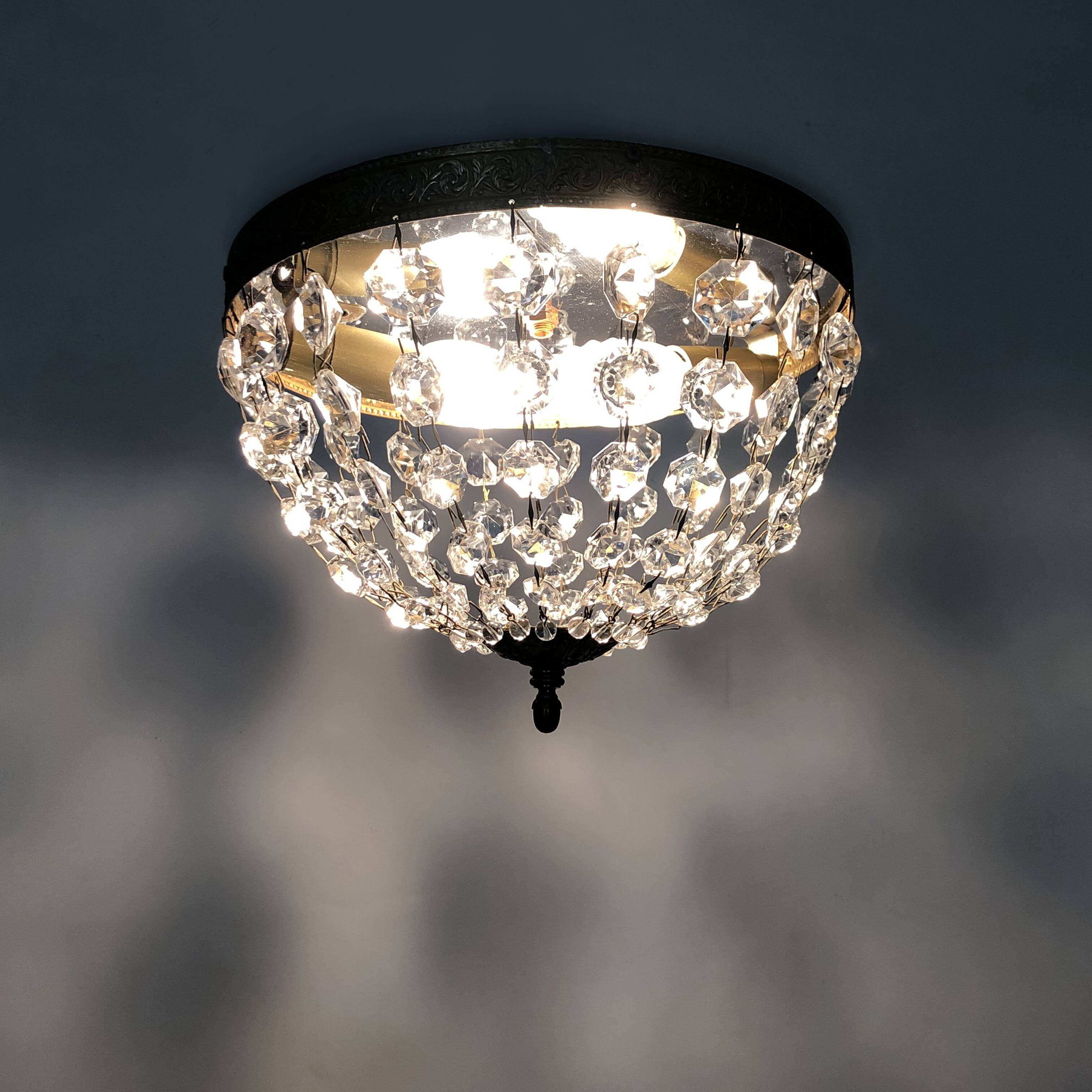 Old crown ceiling light with 2 bulbs, half basket with glass pendants.