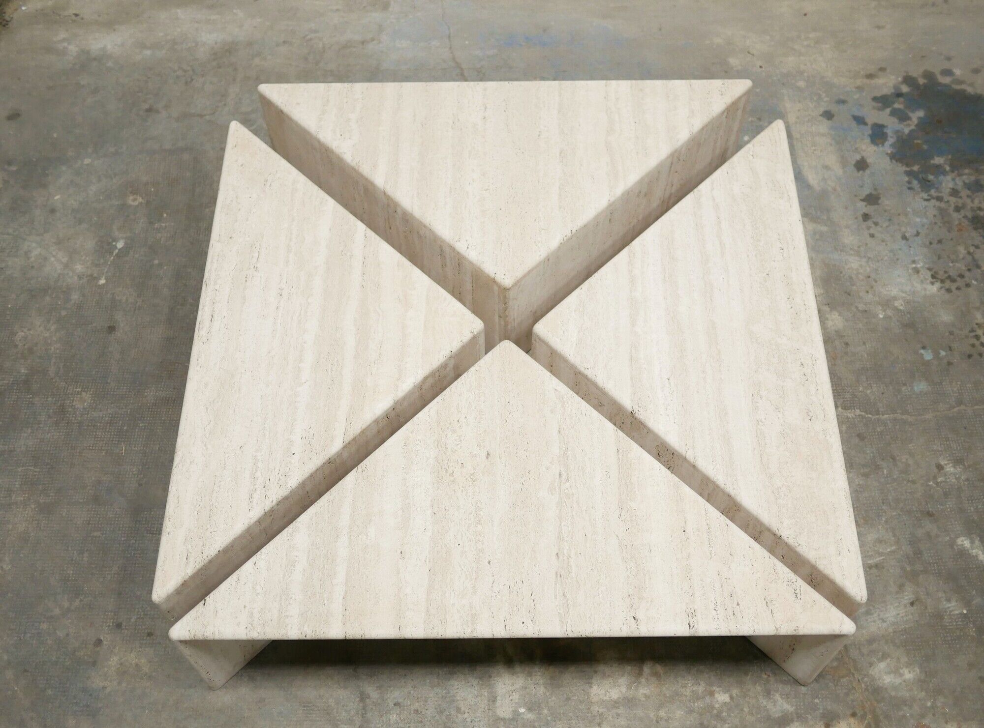 Series of 2 vintage travertine coffee tables published by Roche Bobois