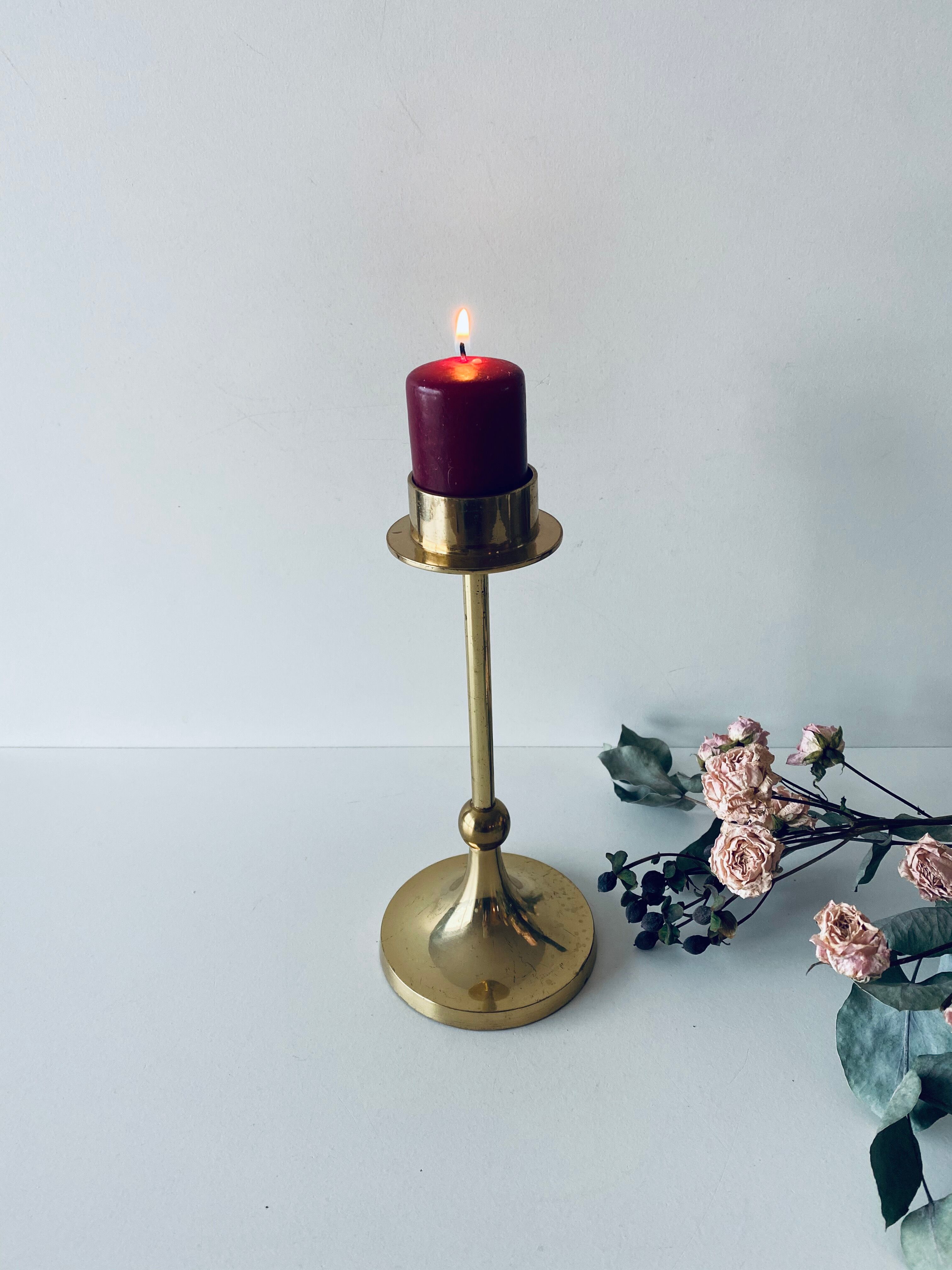 Golden brass candle door