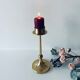 Golden brass candle door