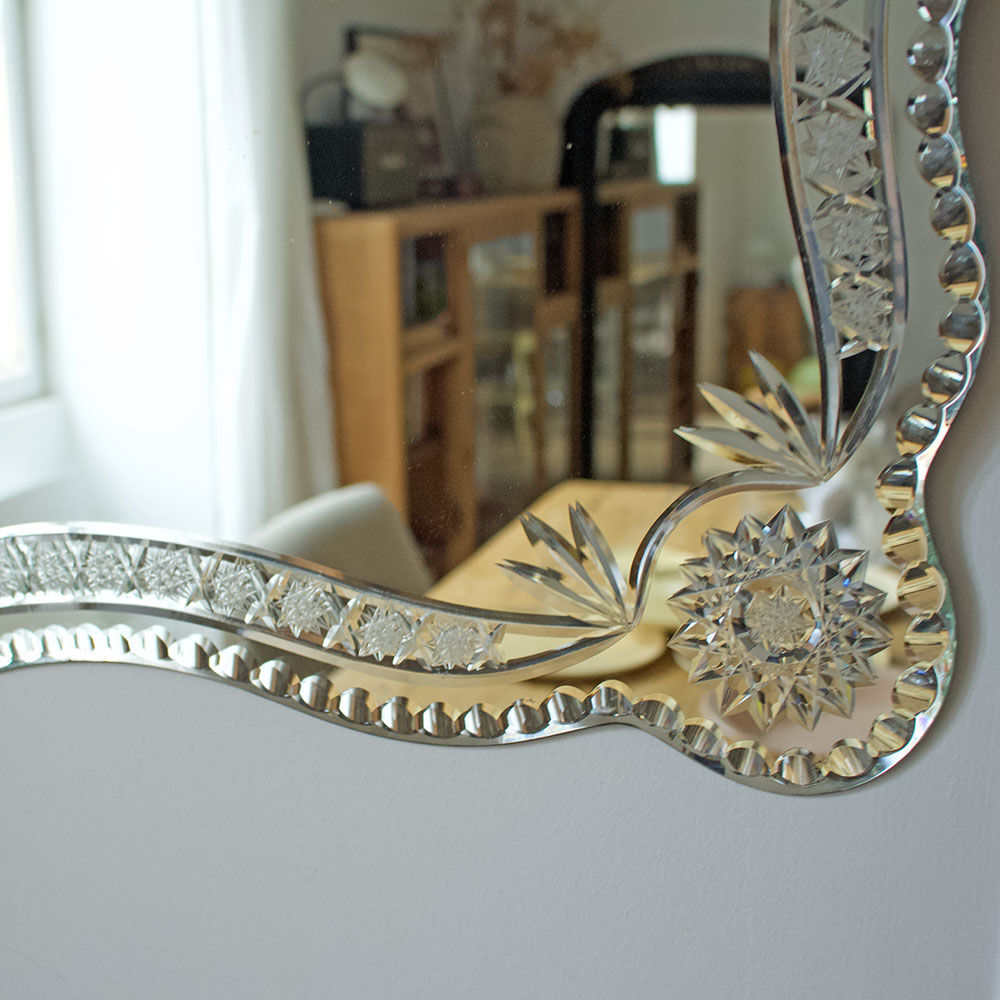 Old chiseled mirror