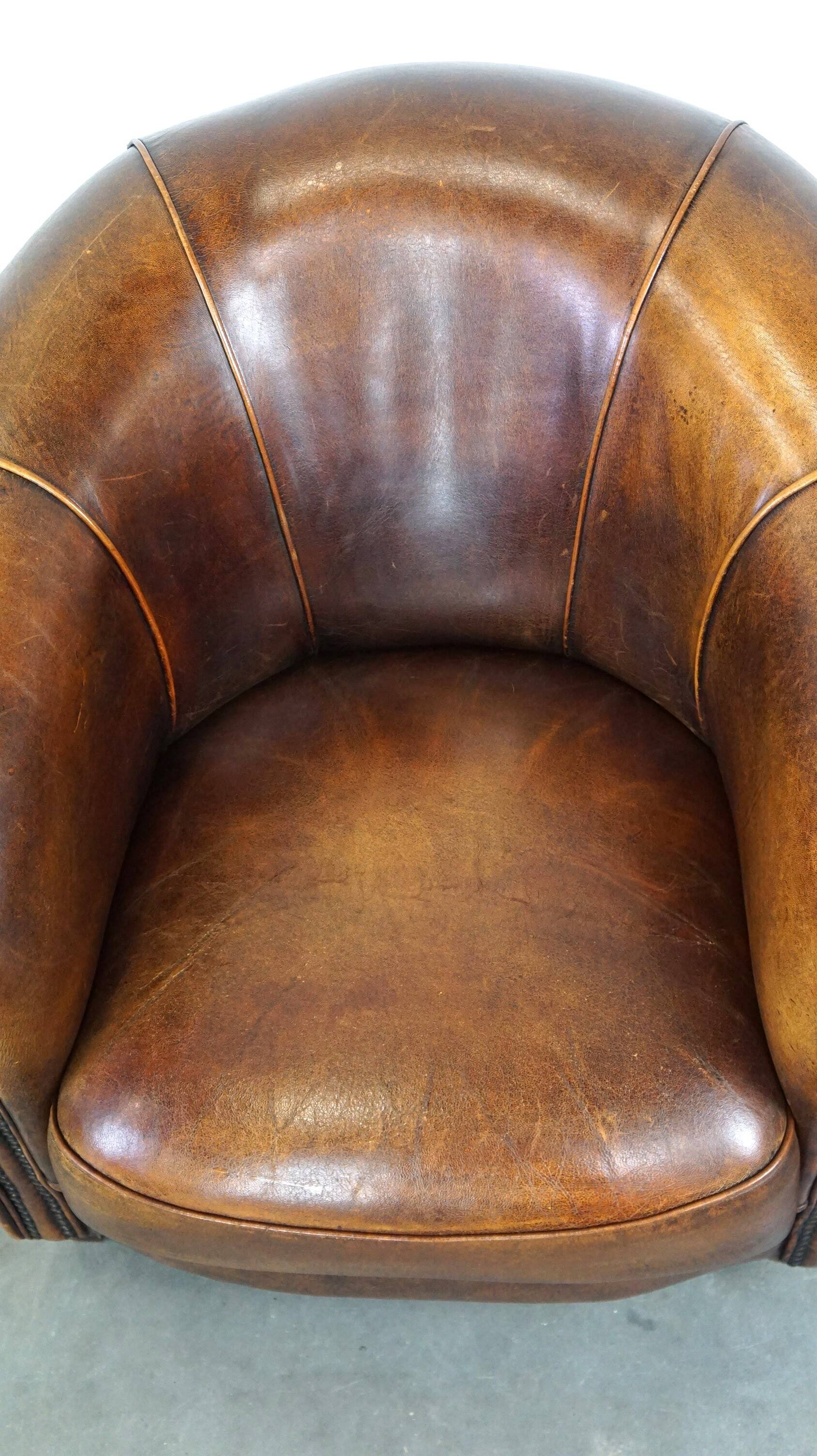 Charming, classy, and comfortable sheepskin leather club armchair