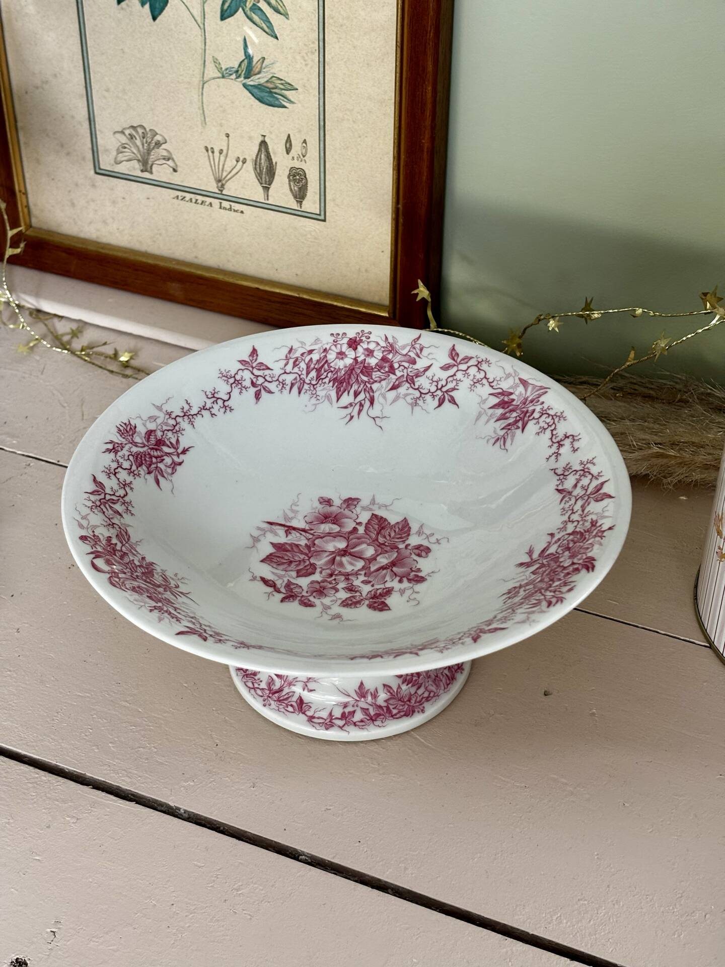 Magnificent antique compote fine porcelain with pink floral decoration.