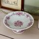 Magnificent antique compote fine porcelain with pink floral decoration.