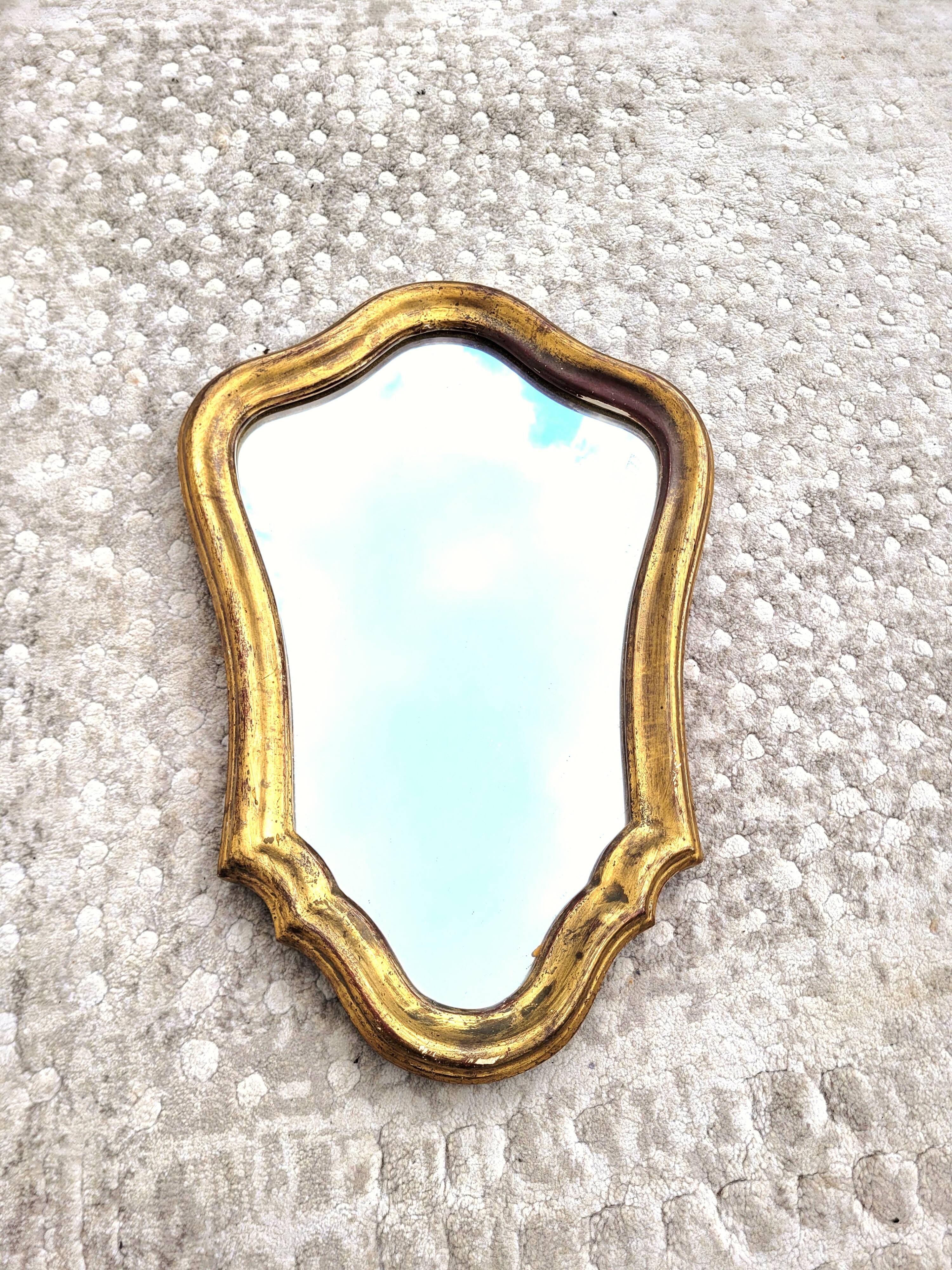Small vintage animated golden mirror 28x40cm