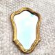 Small vintage animated golden mirror 28x40cm