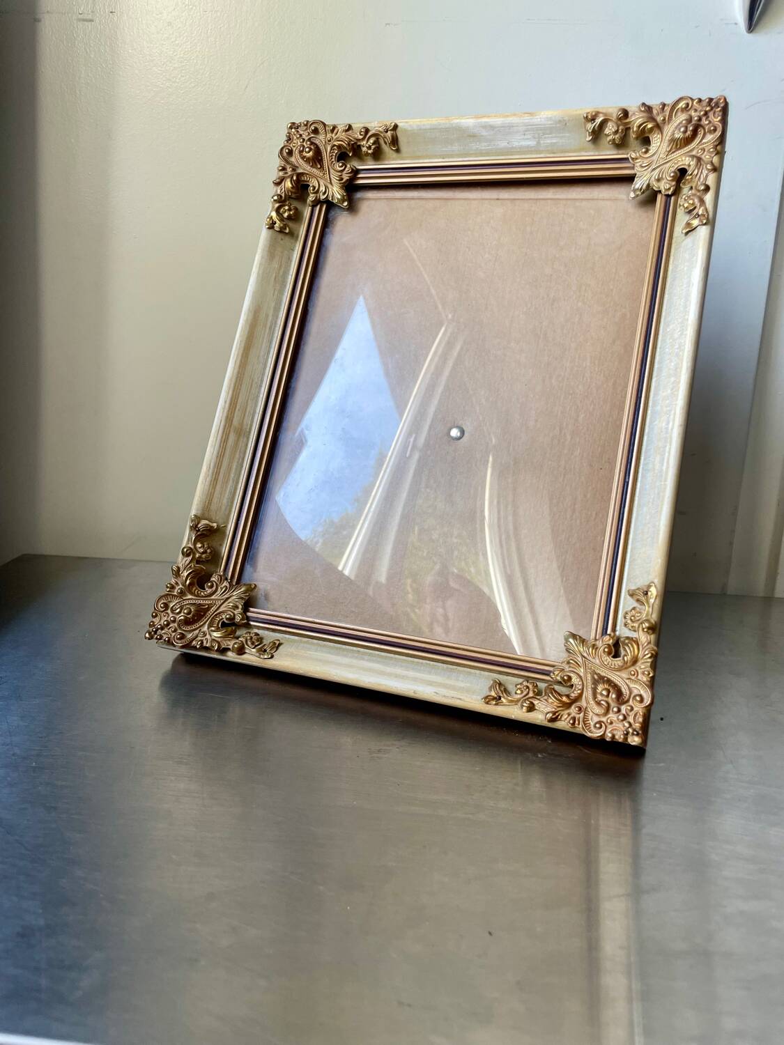 Antique wooden frame with metal gold colored details 28 cm x 22 cm convex glass