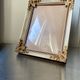 Antique wooden frame with metal gold colored details 28 cm x 22 cm convex glass