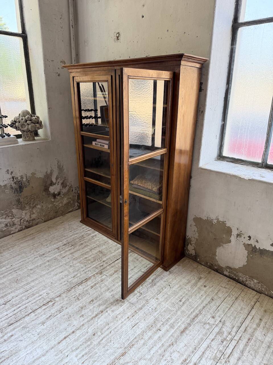 Glass-fronted walnut library 1900