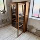 Glass-fronted walnut library 1900