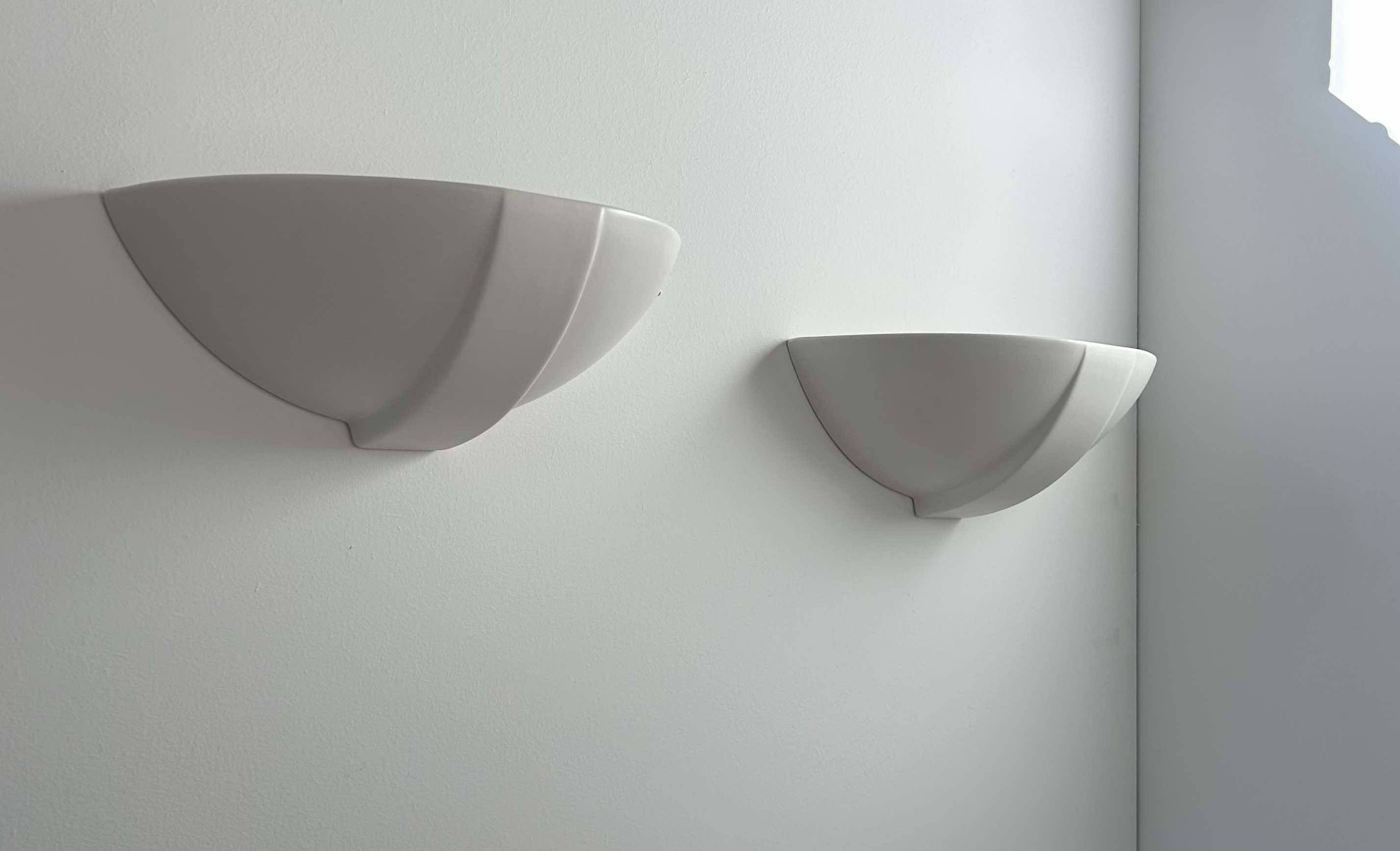Pair of vintage matte white porcelain wall lights, France 1970.