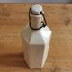 Hexagonal sandstone bottle