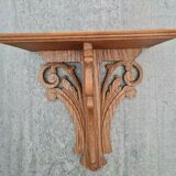 Openwork wooden wall shelf