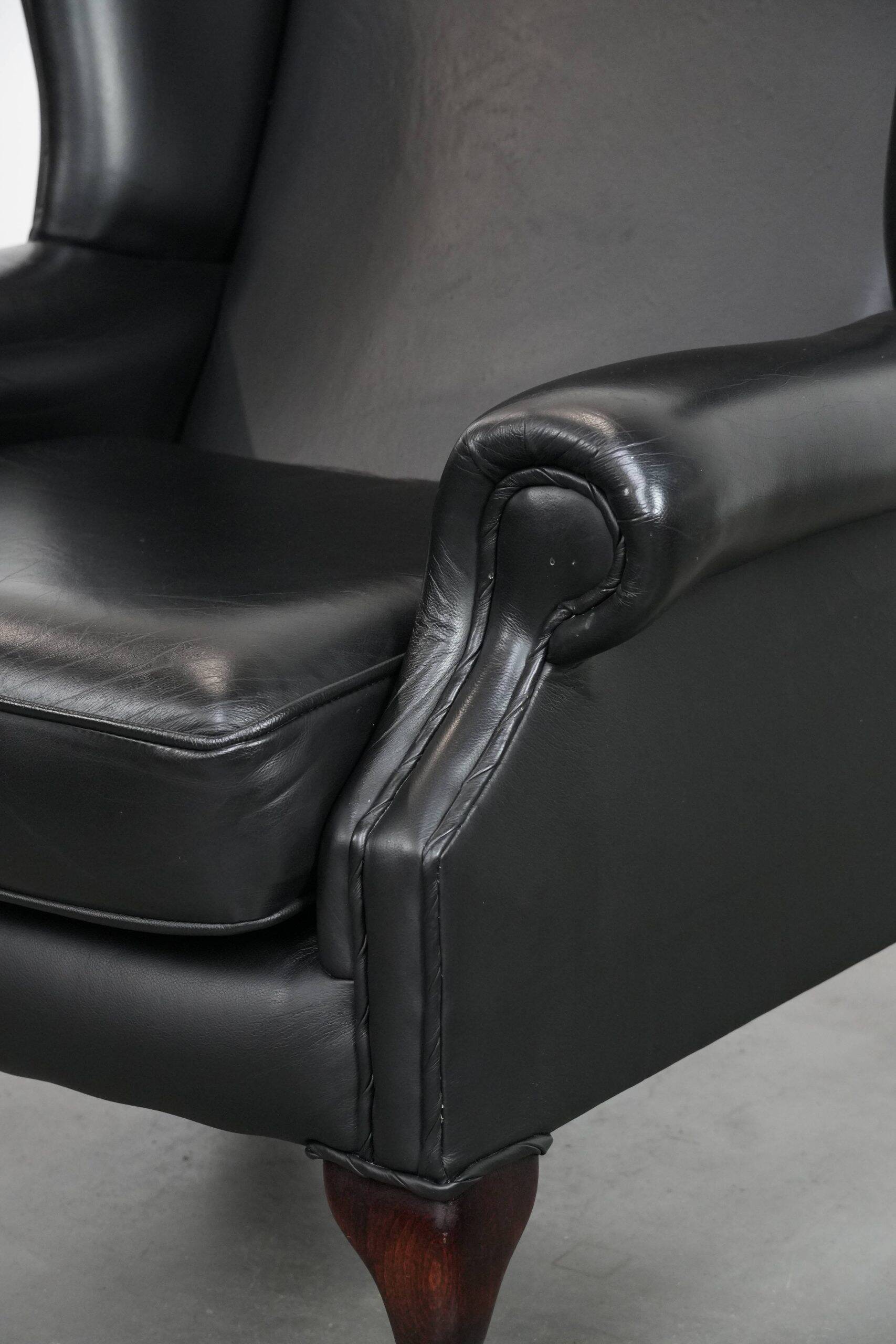 Black cowhide leather Chesterfield wingback chair in English style