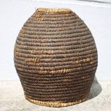 Old basket, burgundy straw and bramble, woven basket, interior decoration, pantry, flowerpot