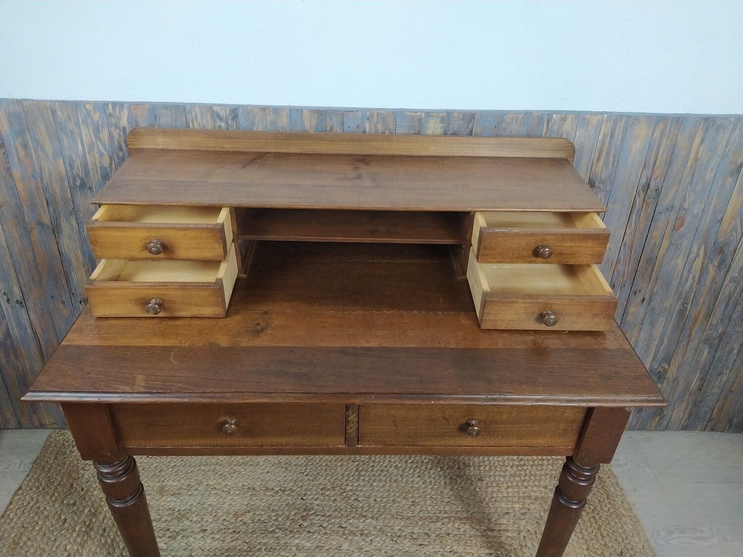 Wooden desk with turned feet