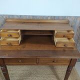 Wooden desk with turned feet