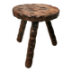 Carved wooden tripod stool
