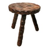 Carved wooden tripod stool