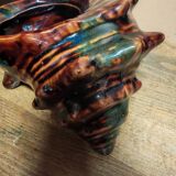 The shell-shaped trinket dish in Vallauris style.