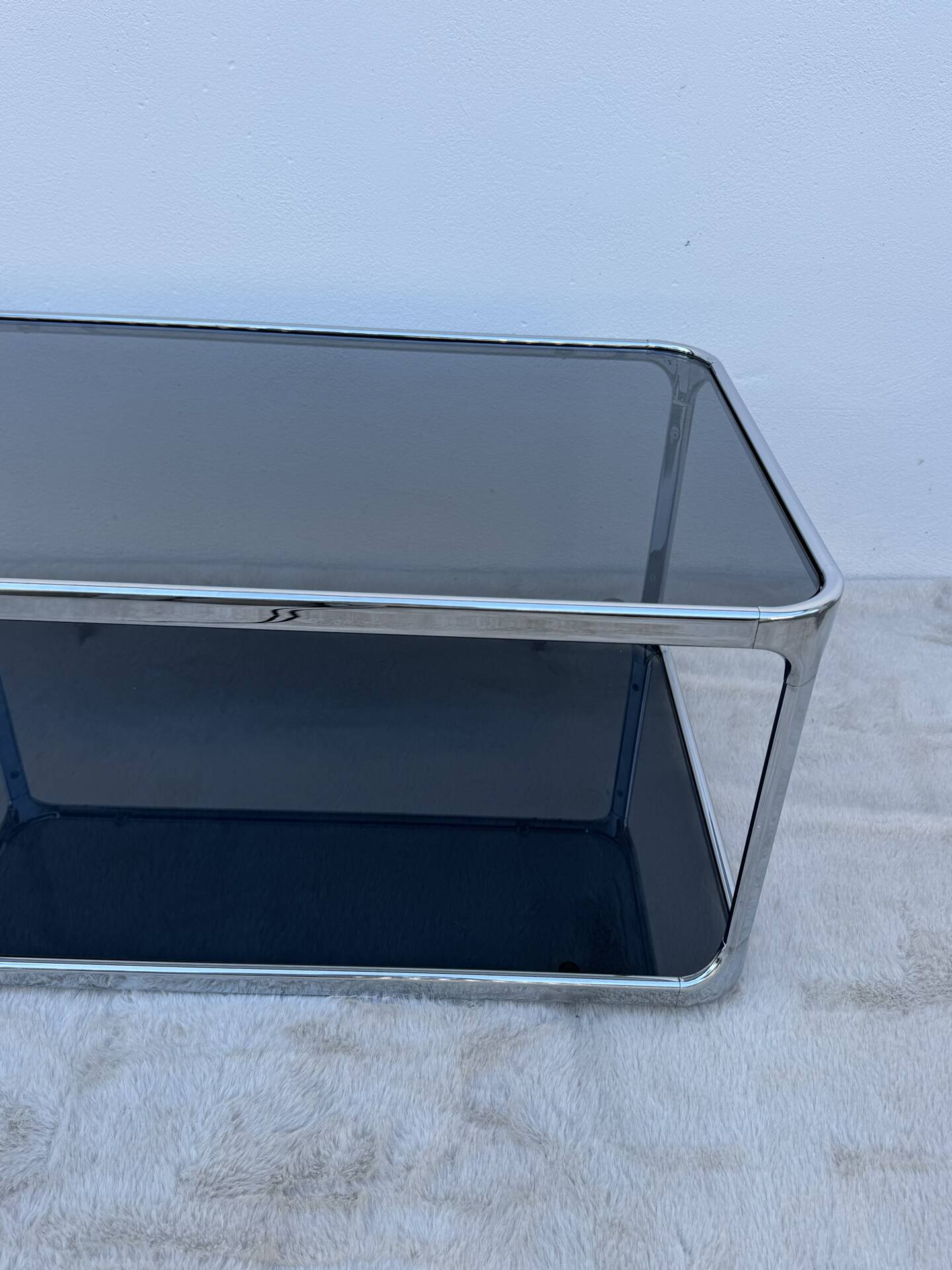 Chrome and smoked glass coffee table from the 1970s.