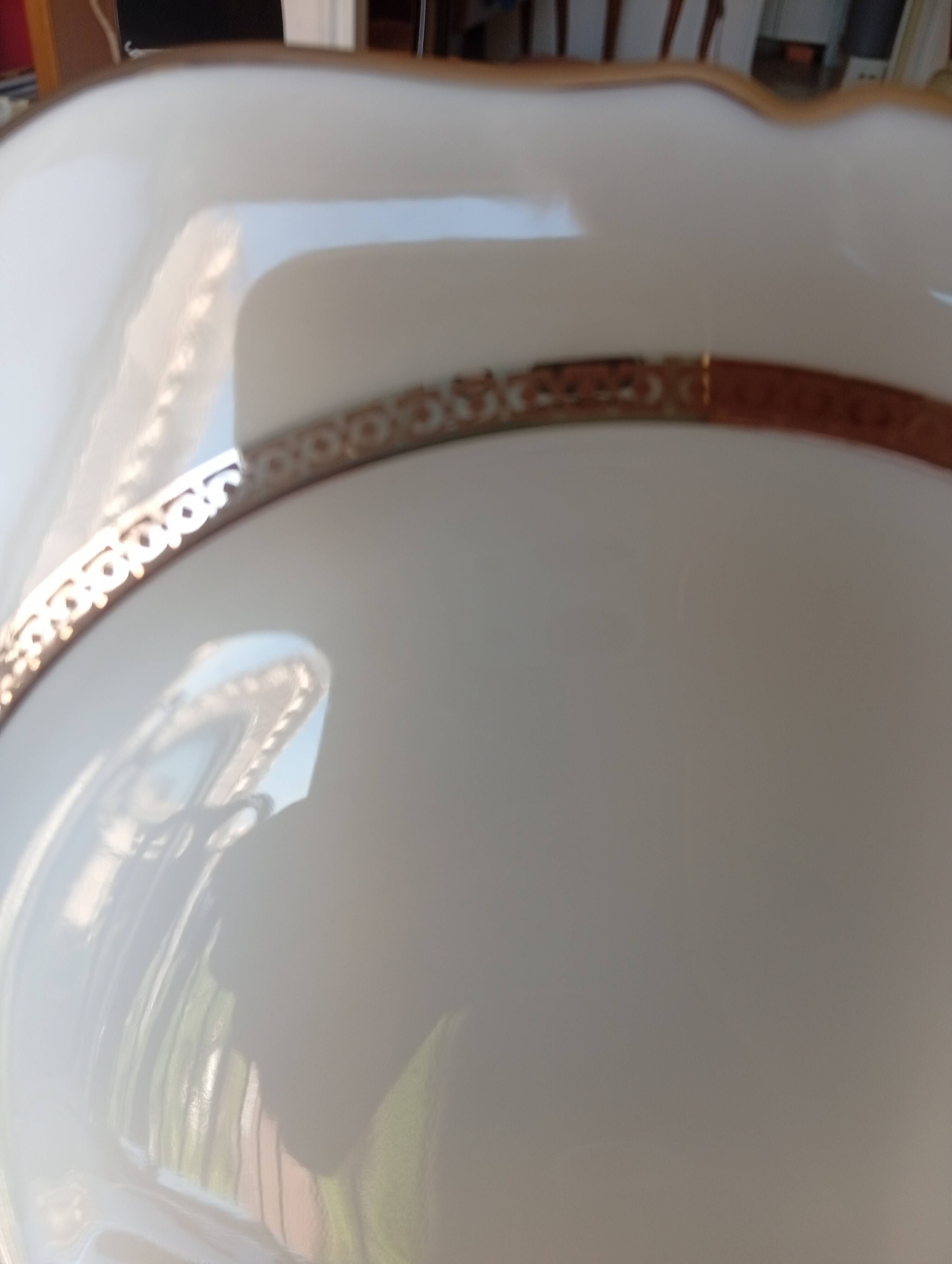 Jean BOYER Limoges FRANCE part of a white porcelain table service.