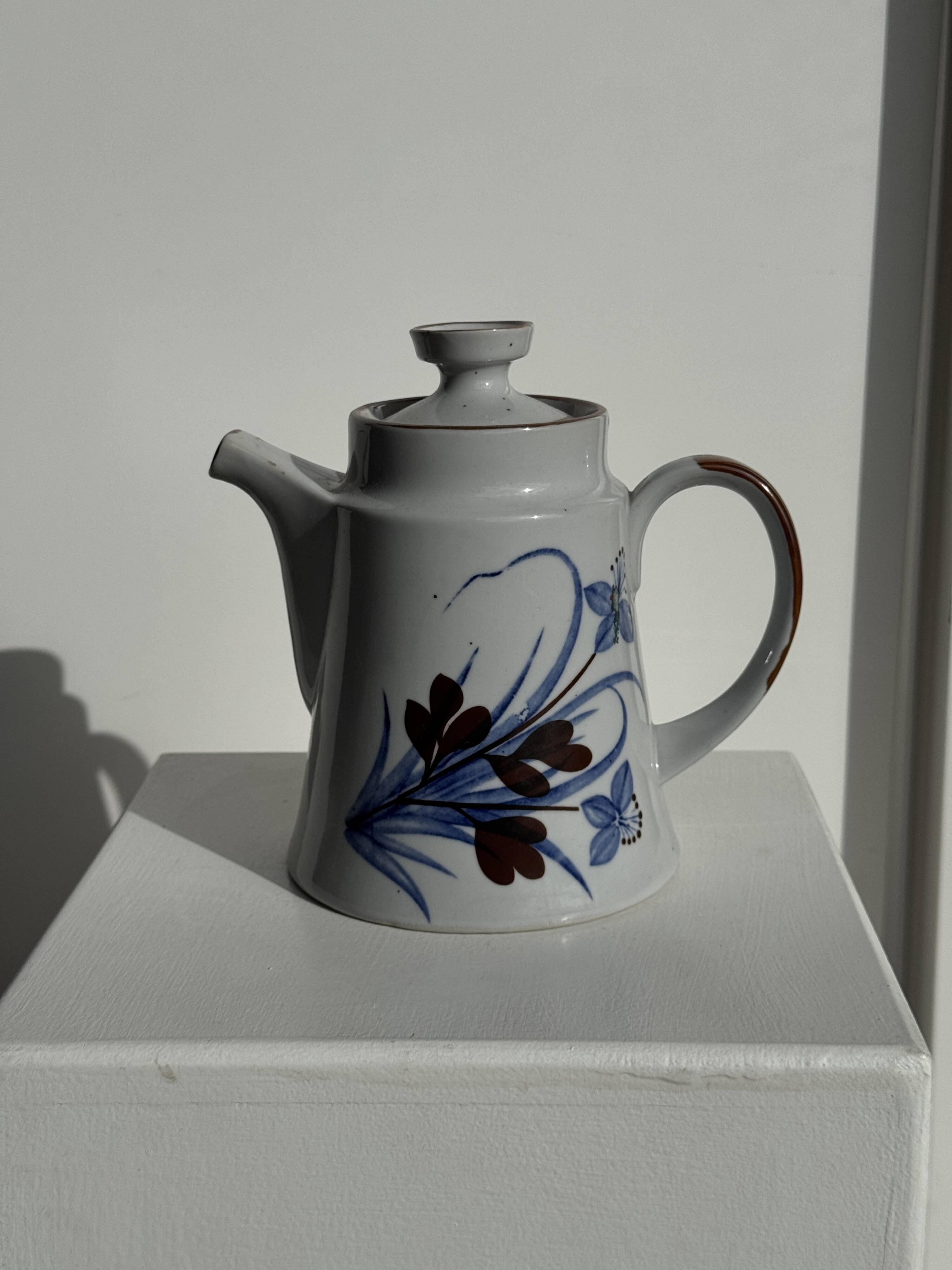 Teapot with stylised blue and brown flowers H18