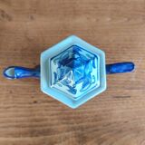 Cobalt blue teapot with flower pattern. Hexagonal teapot