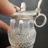 Salt, poivier, mustard with spoons